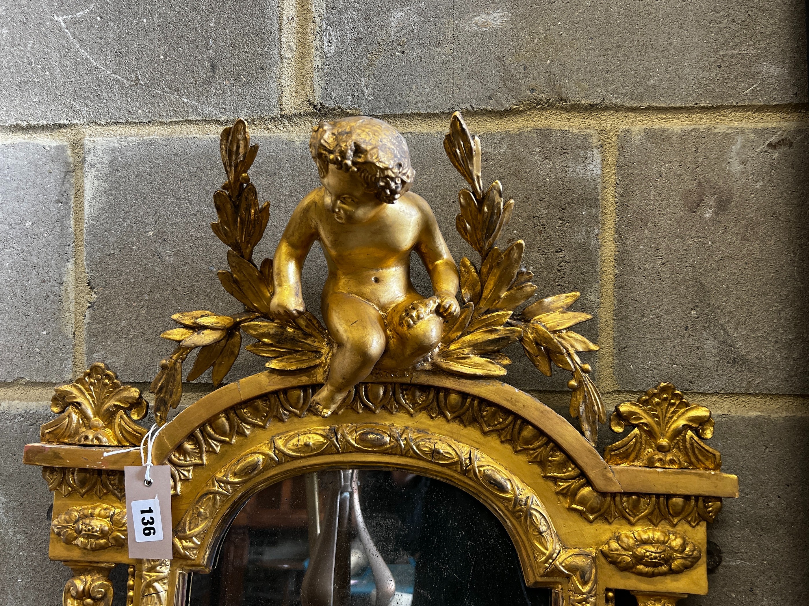 A Victorian giltwood and composition girandole pier glass, width 56cm, height 145cm